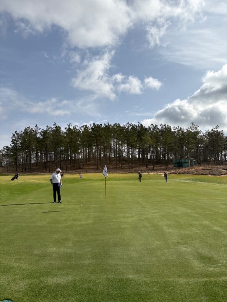 golfers-on-green-trees-nacogdoches-tx-2026-02-18